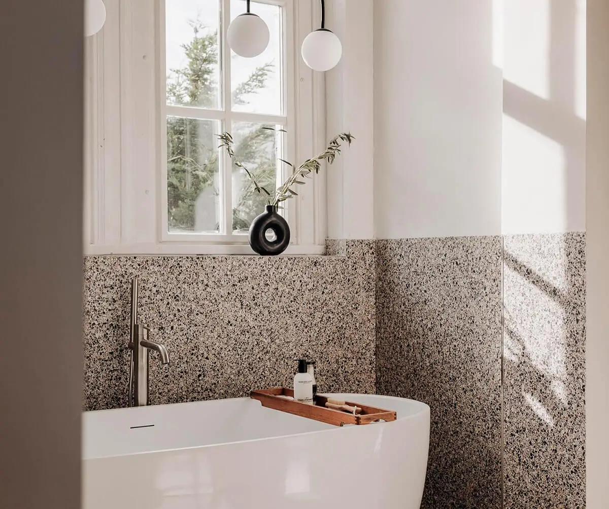 budget vs luxury: how to create a designer bathroom for less | half tiled bathroom wall