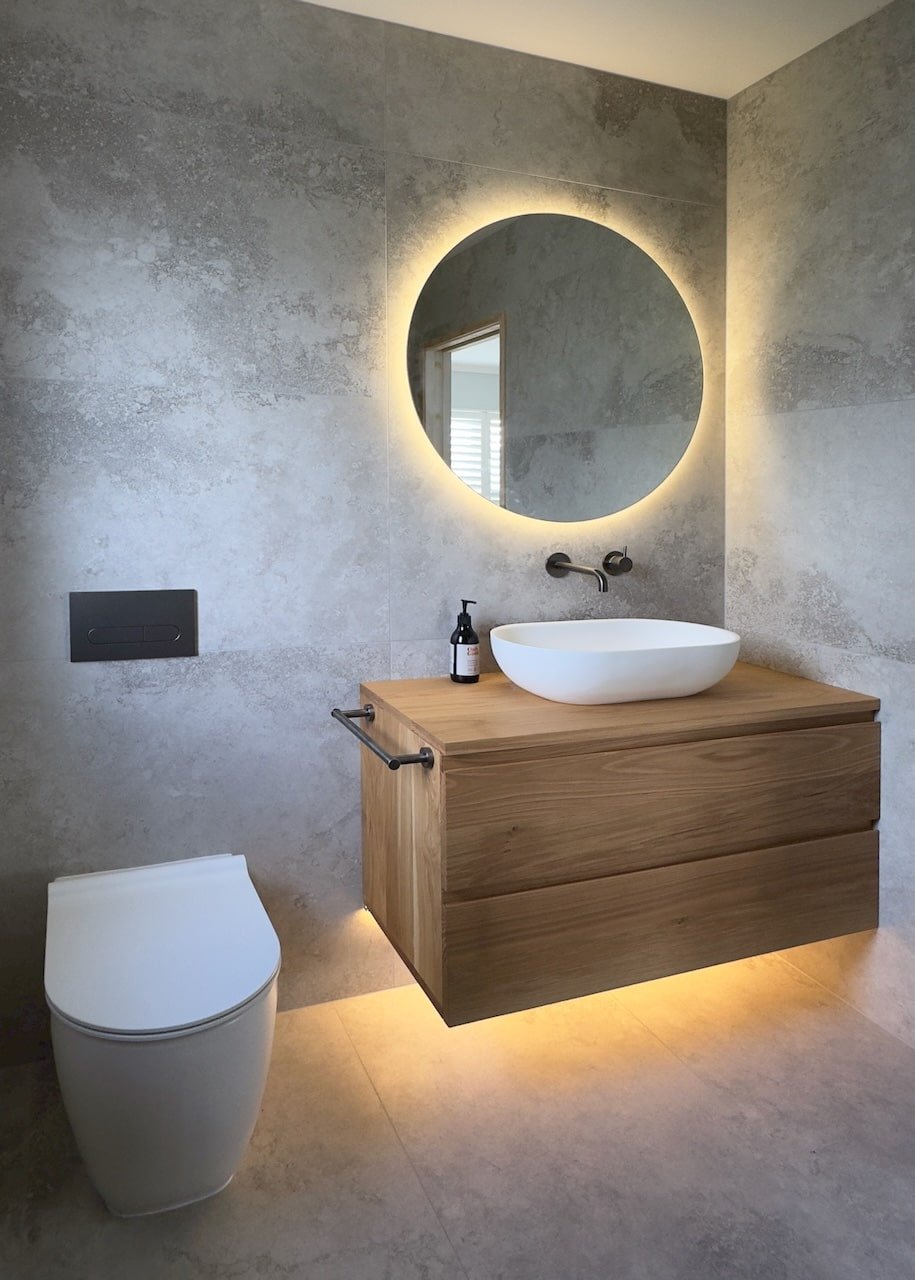 designing a stylish vanity area: essentials & layout tips | lighting underneath bathroom vanity | led strip lighting bathroom