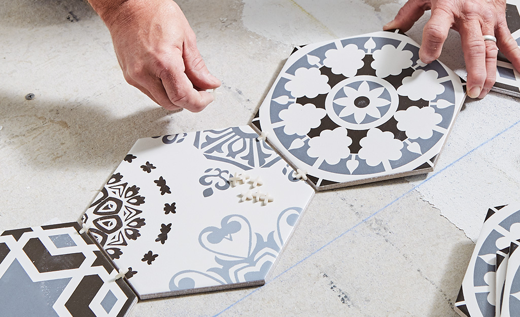 How to install floor tiles | Place tiles carefully using spacers