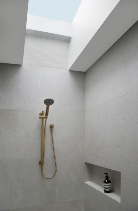 bathroom renovation | brass gold shower head